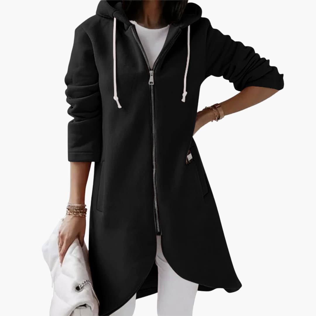 Avslappnad lång damhoodie med dragkedja, en oumbärlig luvtröja för bekväm vardag och mode.