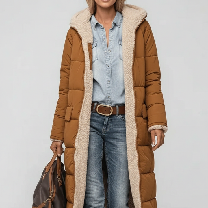Elegant lång damvinterkappa, en varm och trendig puffer för kalla dagar.