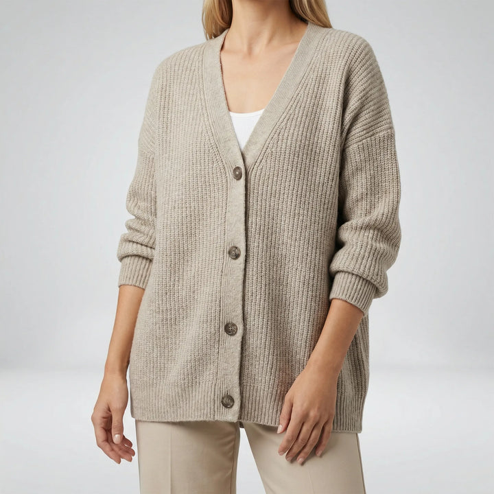 Elegant lång cardigan med öppen framkant för dam, idealisk för lager-på-lager och ledigt vardagsmode.