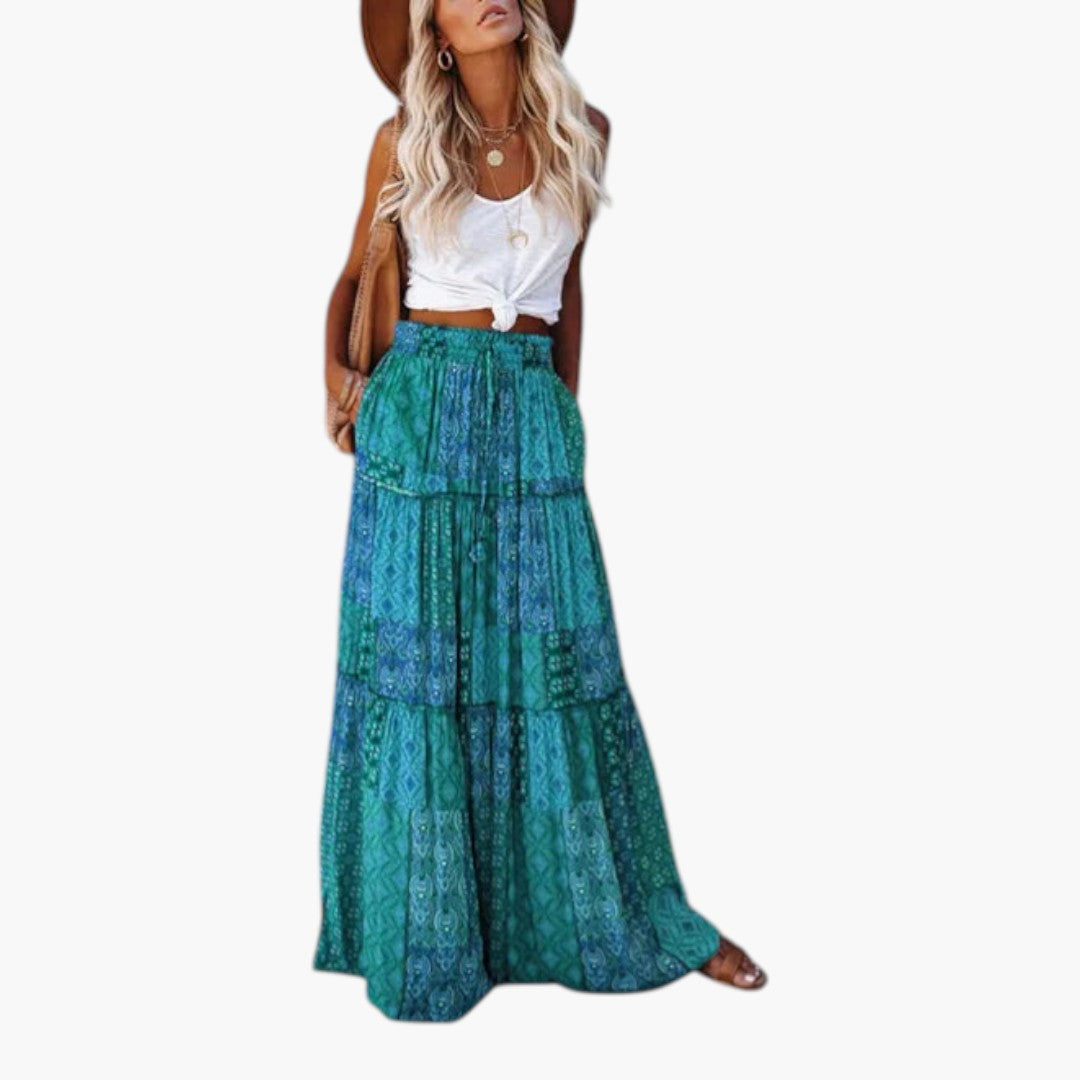 Boho-inspirerad långkjol med volanger, elastisk midja för skön passform. Trendig damkjol.