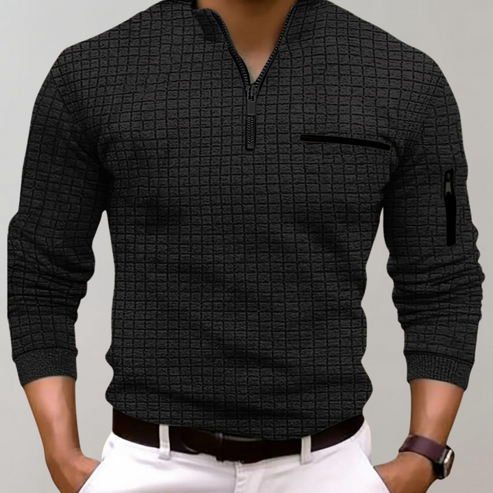 Långärmad herrpolo i klassisk design, perfekt för stilrent höstmode och vardagsbruk. Herrkläder.