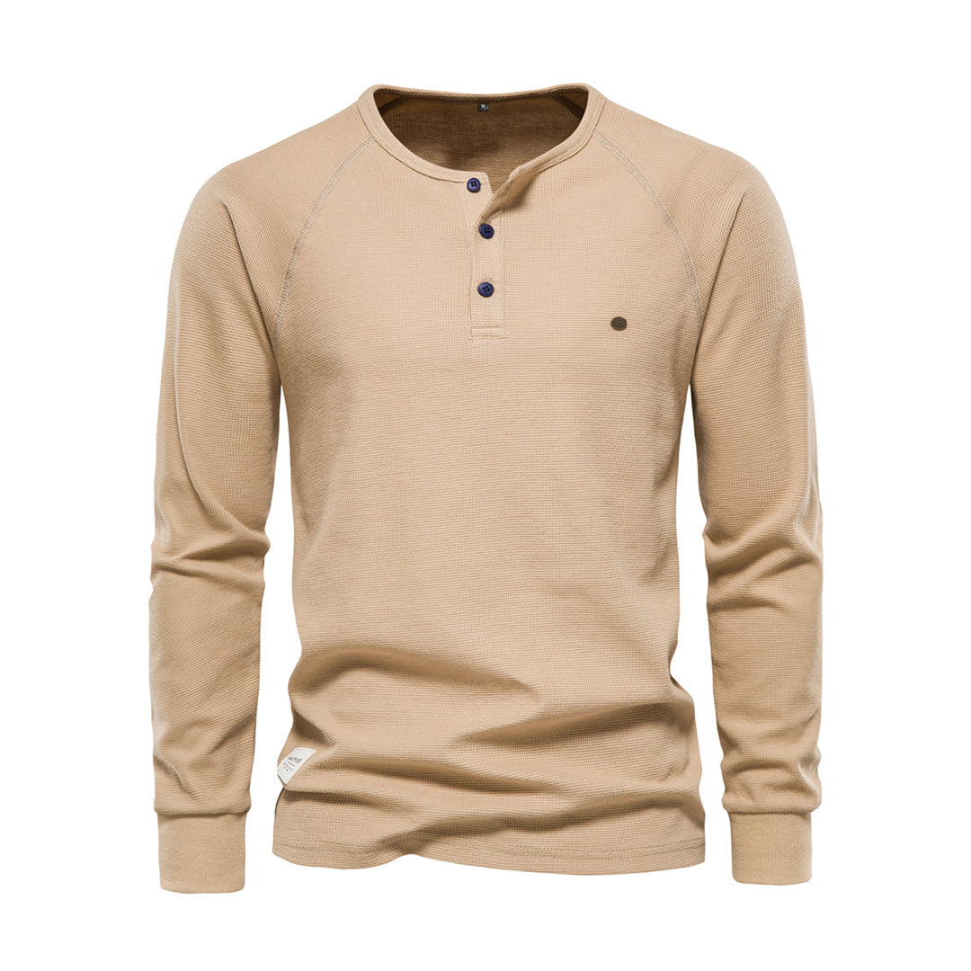 Långärmad herrskjorta med våffelstruktur. Stilren och mångsidig skjorta för casual eller elegant look.