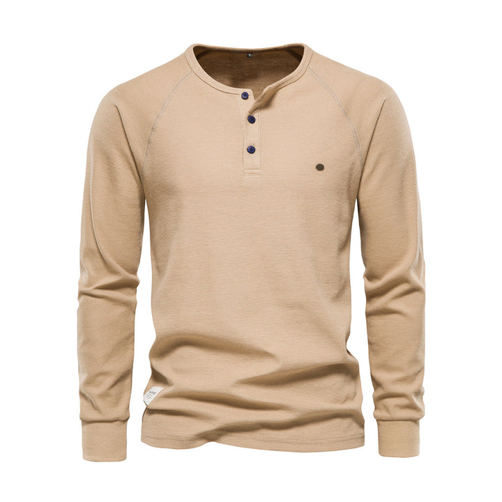 Långärmad herrskjorta med våffelstruktur. Stilren och mångsidig skjorta för casual eller elegant look.
