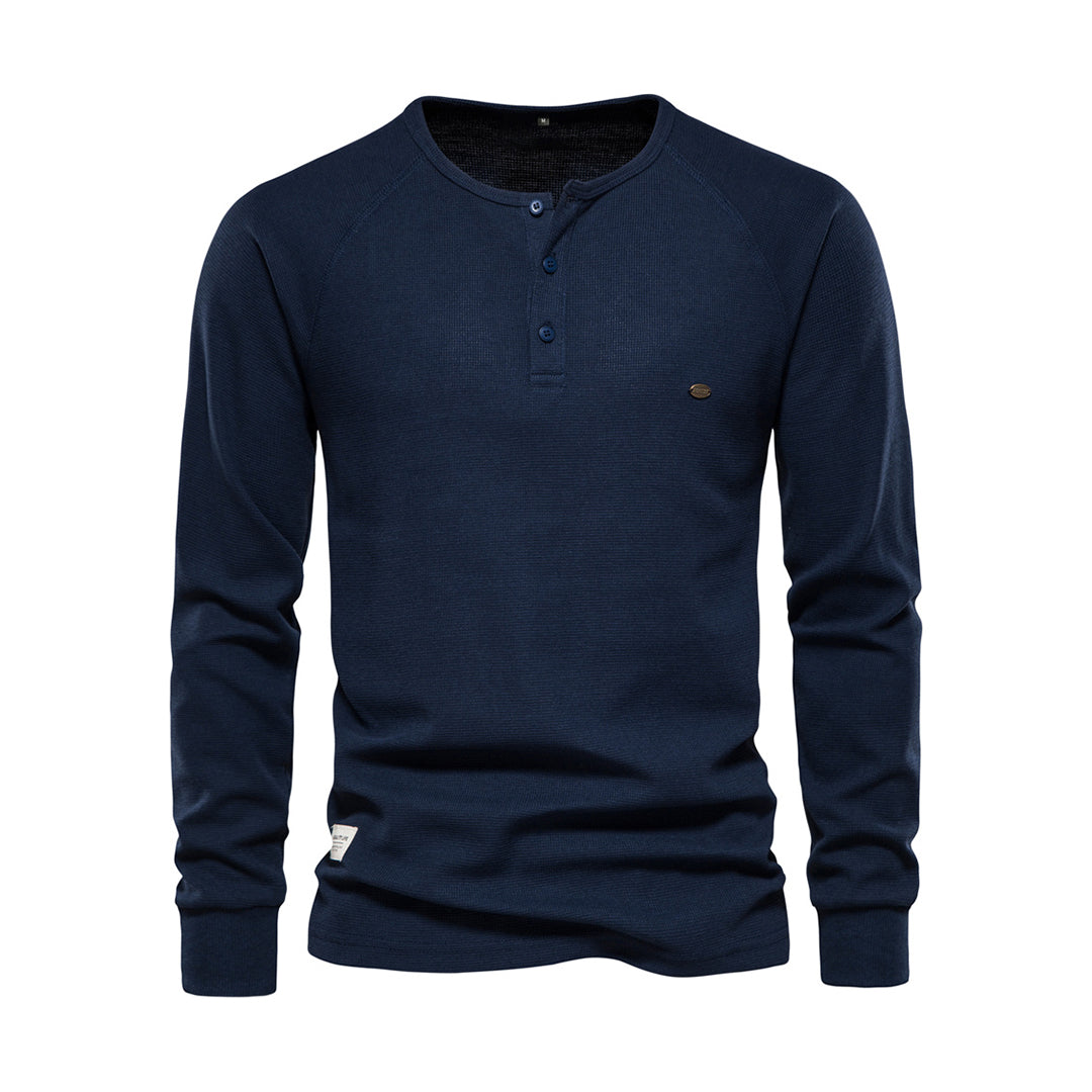 Elegant långärmad herrskjorta i bomull med distinkt våffelstruktur, perfekt för höstmode.