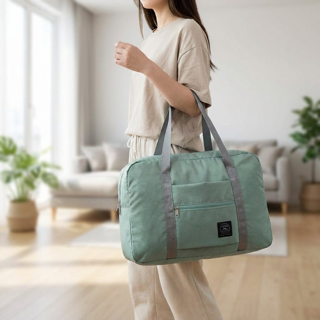 Lättviktig, vattentät & hopfällbar unisex weekendväska i blått. Perfekt handbagage för smidiga flygresor.
