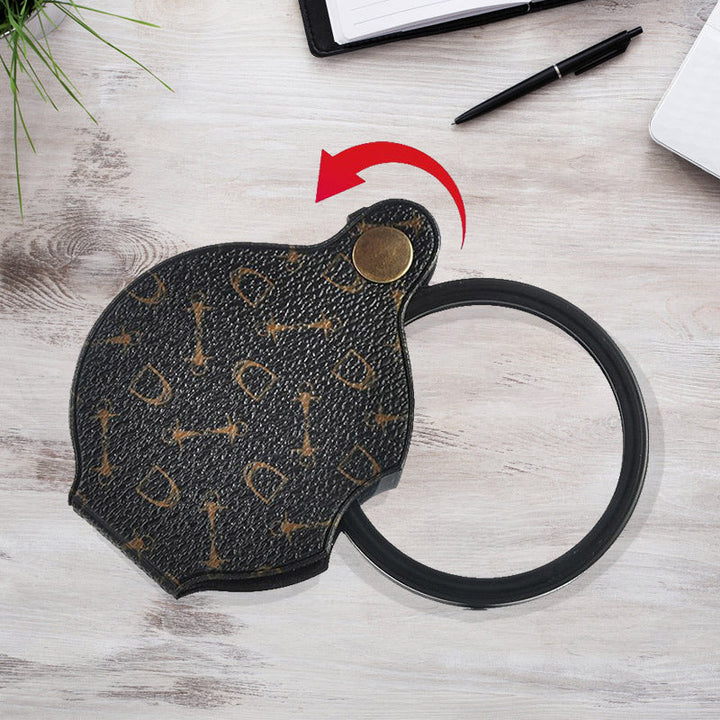 "Läderfodral med förstoringsglas, 15x förstoring, kompakt PU läder, elegant design, för resor och dagligt bruk."