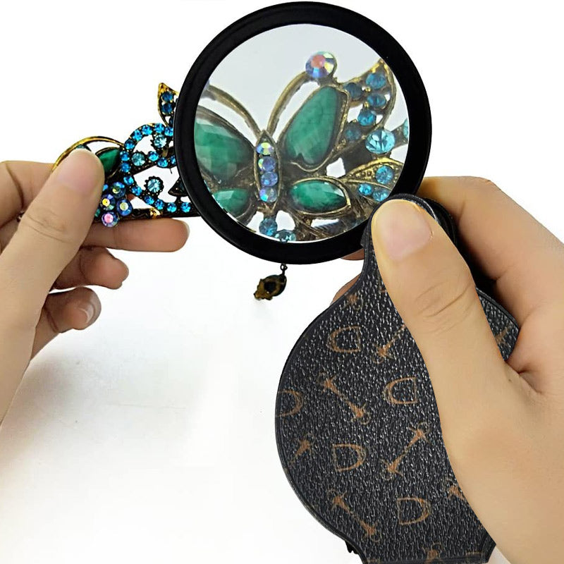 "Läderfodral med förstoringsglas, 15x förstoring, kompakt PU läder, elegant design, för resor och dagligt bruk."