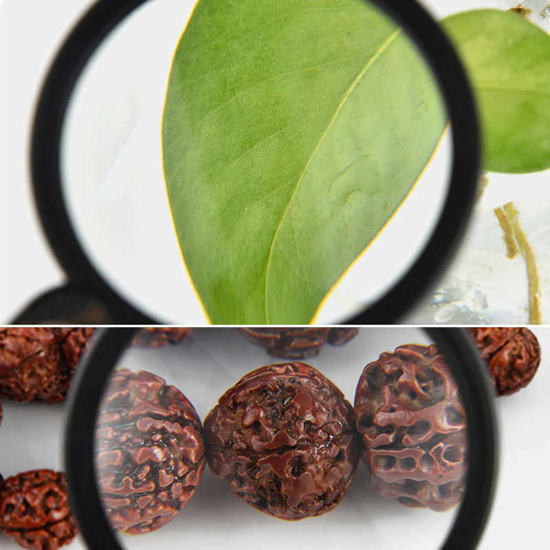 "Läderfodral med förstoringsglas, 15x förstoring, kompakt PU läder, elegant design, för resor och dagligt bruk."