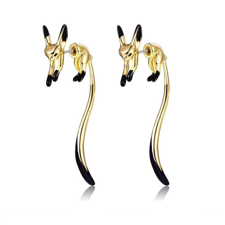 "Långa eleganta rävörhängen för kvinnor i roseguld, guld och silver. Smycke med unik design, symboliserar intelligens."