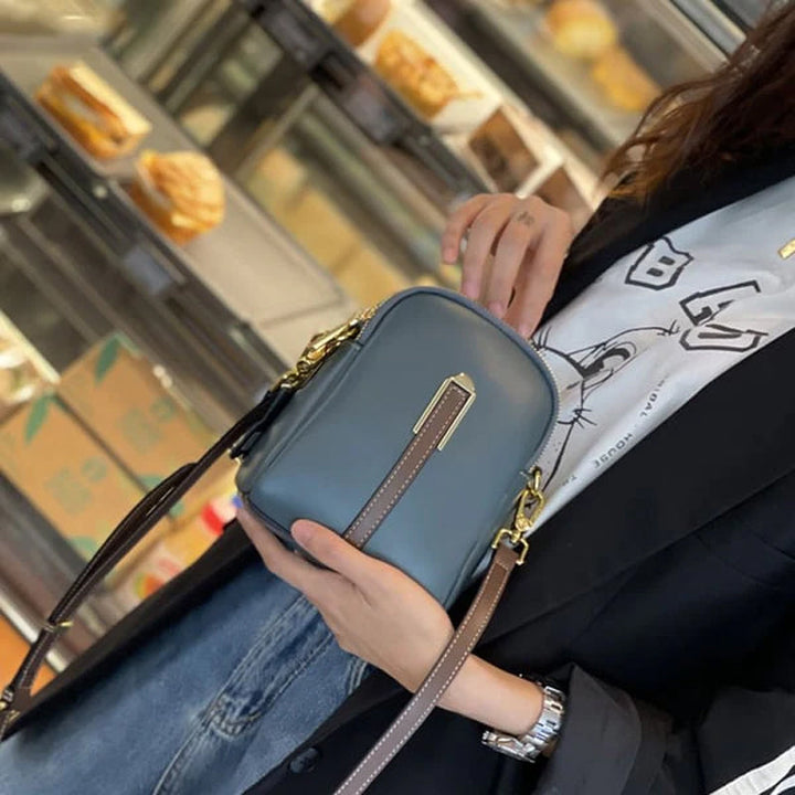 "Lätt och elegant mini crossbody damväska i PU-läder, flera färger, perfekt för alla säsonger, mode och funktion."