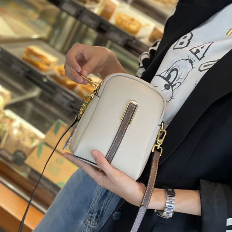 "Lätt och elegant mini crossbody damväska i PU-läder, flera färger, perfekt för alla säsonger, mode och funktion."