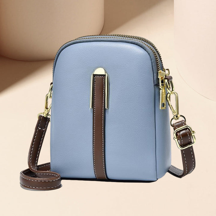"Lätt och elegant mini crossbody damväska i PU-läder, flera färger, perfekt för alla säsonger, mode och funktion."