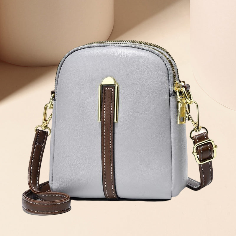 "Lätt och elegant mini crossbody damväska i PU-läder, flera färger, perfekt för alla säsonger, mode och funktion."