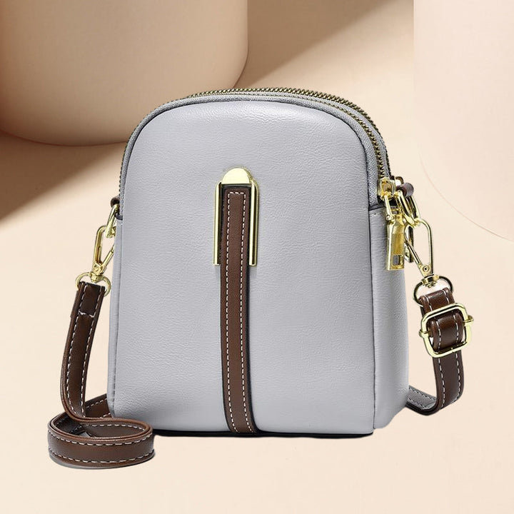 "Lätt och elegant mini crossbody damväska i PU-läder, flera färger, perfekt för alla säsonger, mode och funktion."