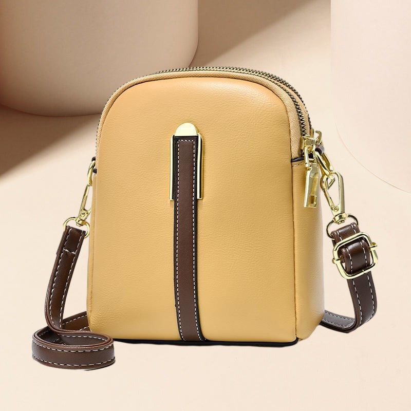 "Lätt och elegant mini crossbody damväska i PU-läder, flera färger, perfekt för alla säsonger, mode och funktion."