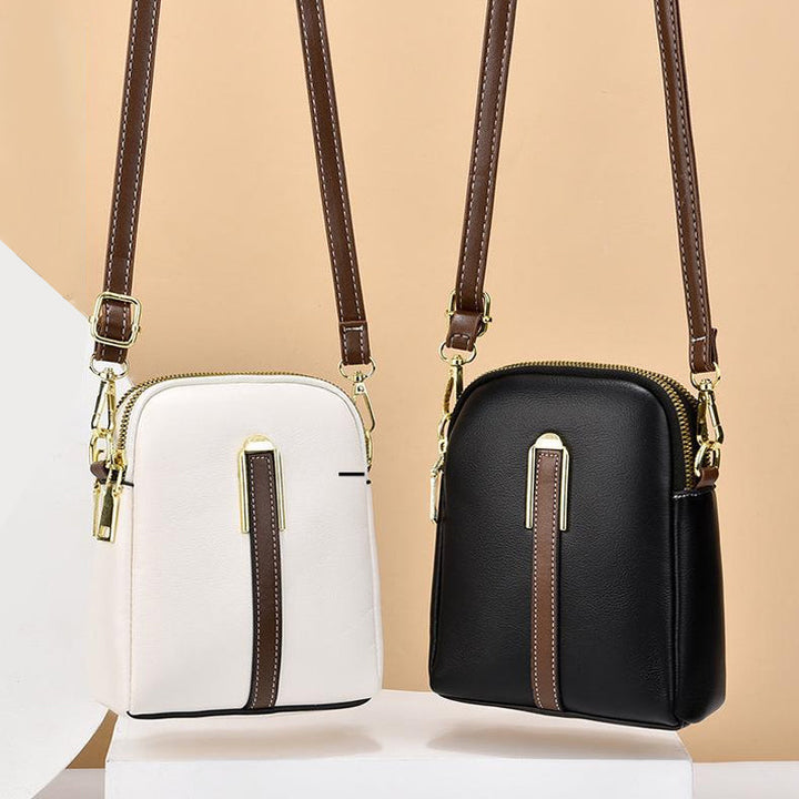 "Lätt och elegant mini crossbody damväska i PU-läder, flera färger, perfekt för alla säsonger, mode och funktion."