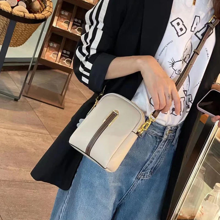"Lätt och elegant mini crossbody damväska i PU-läder, flera färger, perfekt för alla säsonger, mode och funktion."