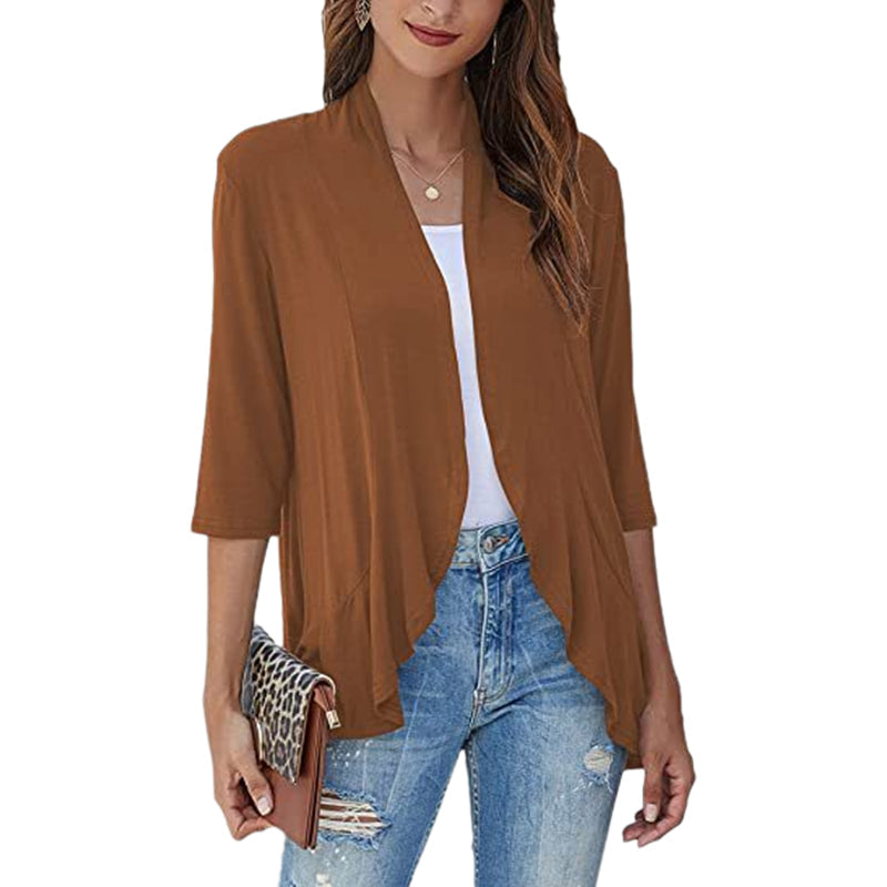 Lättvikts vår-sommar cardigan med 3/4 ärmar, öppen design och oregelbunden fåll, perfekt för modernt kvinno-mode.