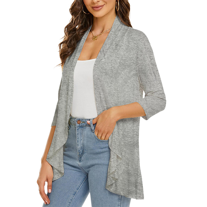 Lättvikts vår-sommar cardigan med 3/4 ärmar, öppen design och oregelbunden fåll, perfekt för modernt kvinno-mode.