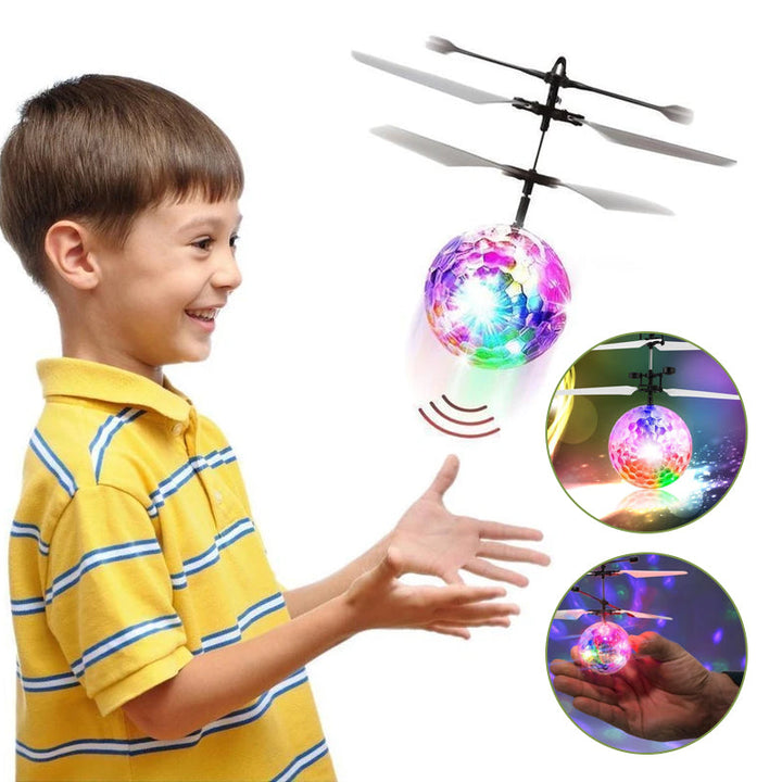 "LED flygande boll för barn med färgglad belysning, transparent kropp och inbyggda svävsensorer, säker och lekvänlig."