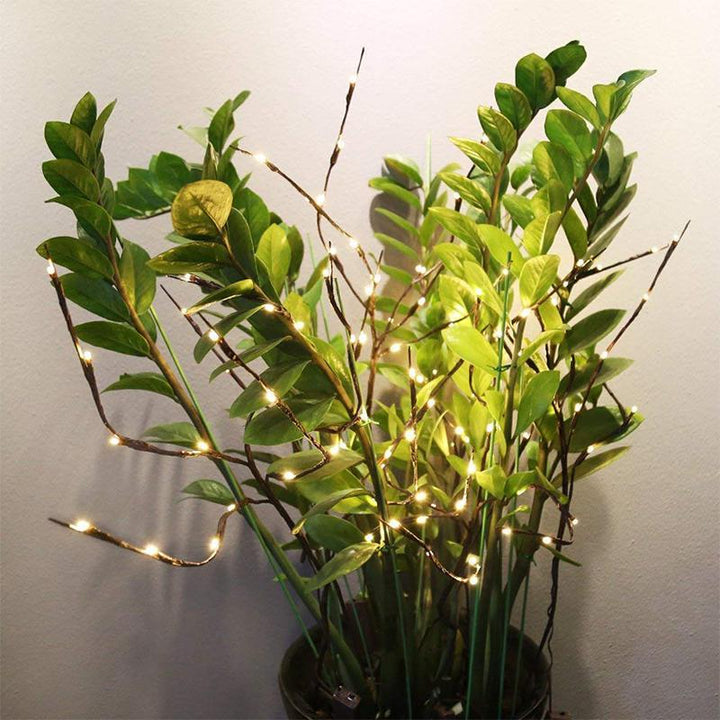 "LED kvistljus med varmvit glöd, naturlig design, 5-10 kvistar, 20-40 LED-lampor, elegant och stämningsfull belysning"