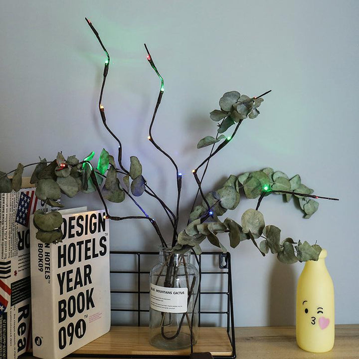 "LED kvistljus med varmvit glöd, naturlig design, 5-10 kvistar, 20-40 LED-lampor, elegant och stämningsfull belysning"