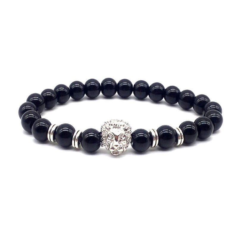 "Lejonarmband för män med onyx och stål, mattsvarta pärlor och lejonhuvud, symbol för styrka och kärlek"