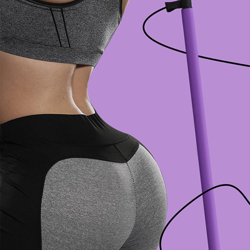 "Lila Pilates träningsband för hemmabruk med motstånd, tvådelad stång, elastiska band, perfekt för varierad workout."