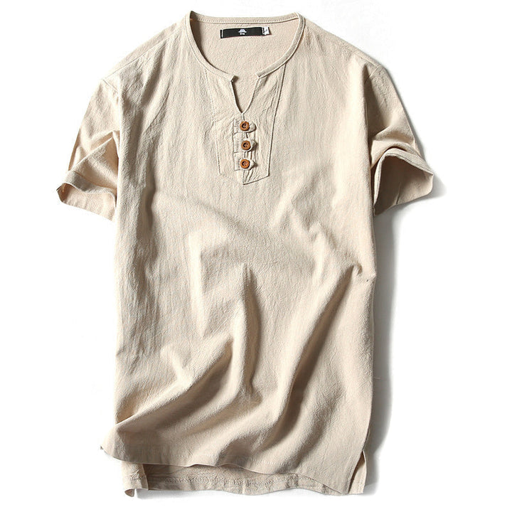 "Linne T-shirt för män, marinblå, med knappar framtill, avslappnad passform. Perfekt för sommaren, stilren och bekväm."
