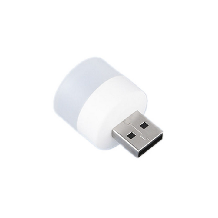 Liten USB LED nattlampa med ögonskydd, kompakt och stilren, avger mjukt vitt ljus, perfekt för sovrum och resor.