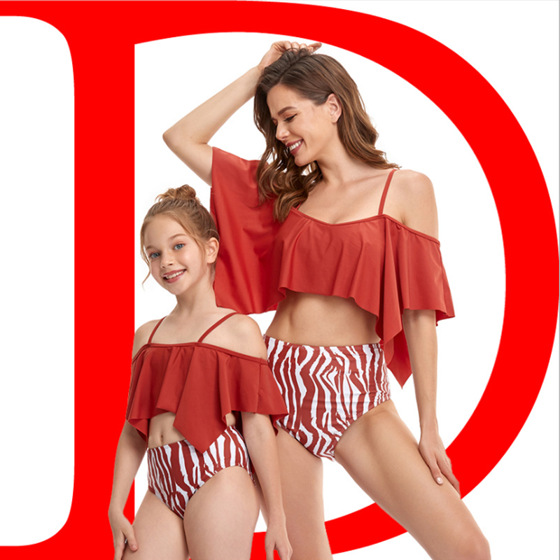 "Livfull matchande bikini med ruffle-design för barn och vuxna, perfekt för strand och pool. Välj unikt och stilfullt."