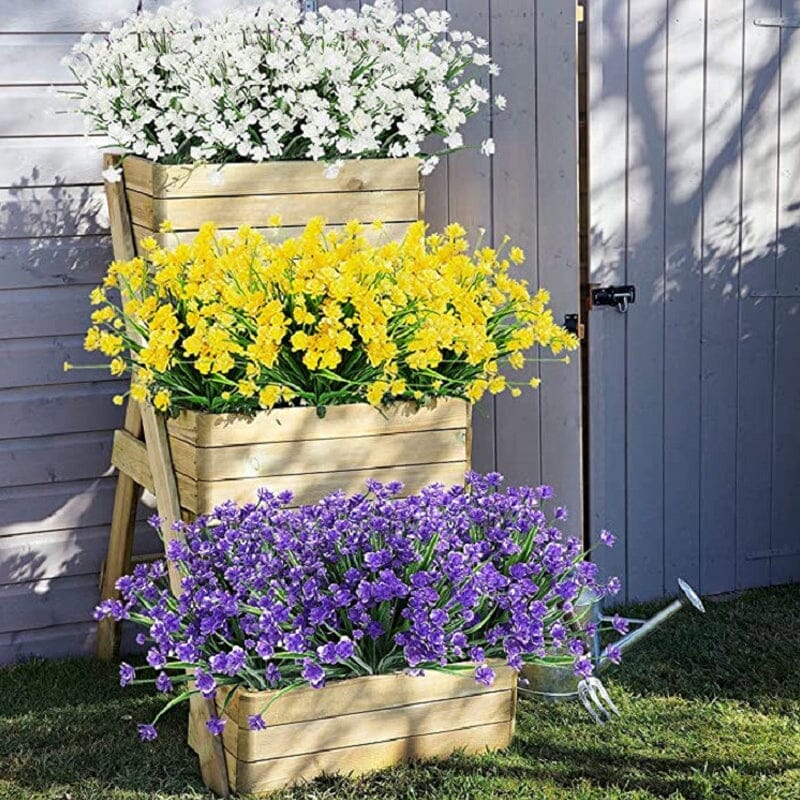 "Livfulla utomhus konstgjorda blommor med naturligt utseende i livliga färger, perfekt för enkel och elegant dekoration."