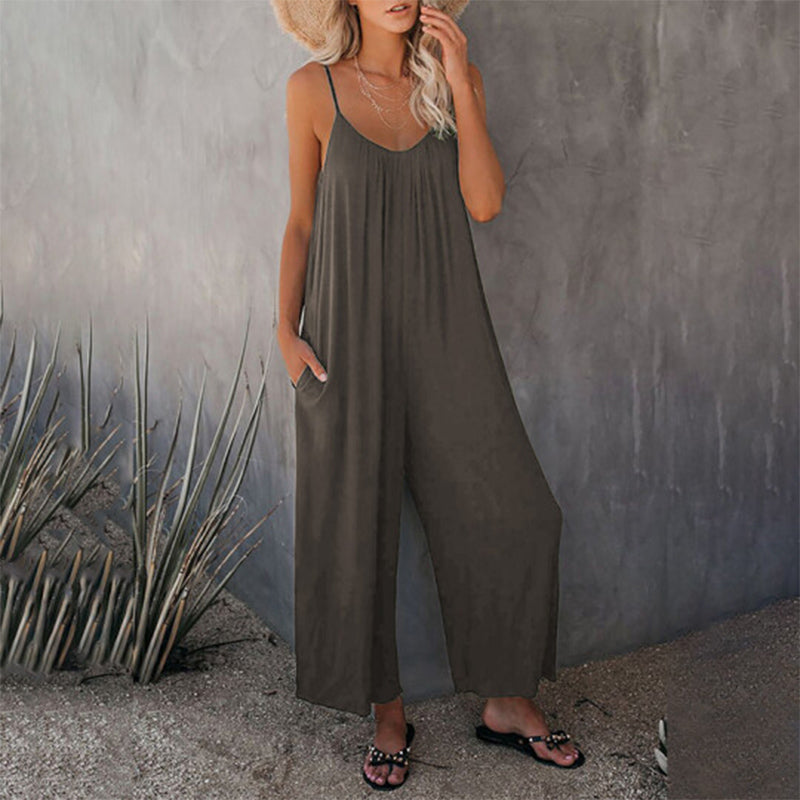 Lös dam cami stretch jumpsuit i flera färger, polyesterblandning, flytande passform, perfekt för sommaraktiviteter.