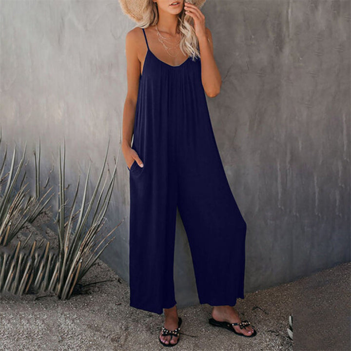 Lös dam cami stretch jumpsuit i flera färger, polyesterblandning, flytande passform, perfekt för sommaraktiviteter.
