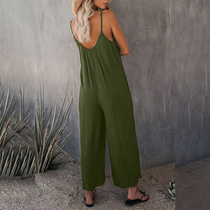 Lös dam cami stretch jumpsuit i flera färger, polyesterblandning, flytande passform, perfekt för sommaraktiviteter.