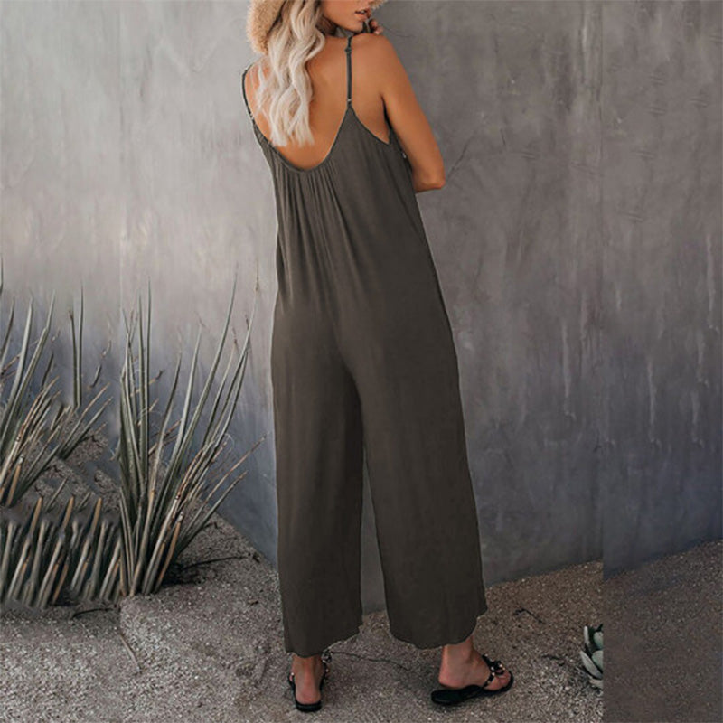 Lös dam cami stretch jumpsuit i flera färger, polyesterblandning, flytande passform, perfekt för sommaraktiviteter.