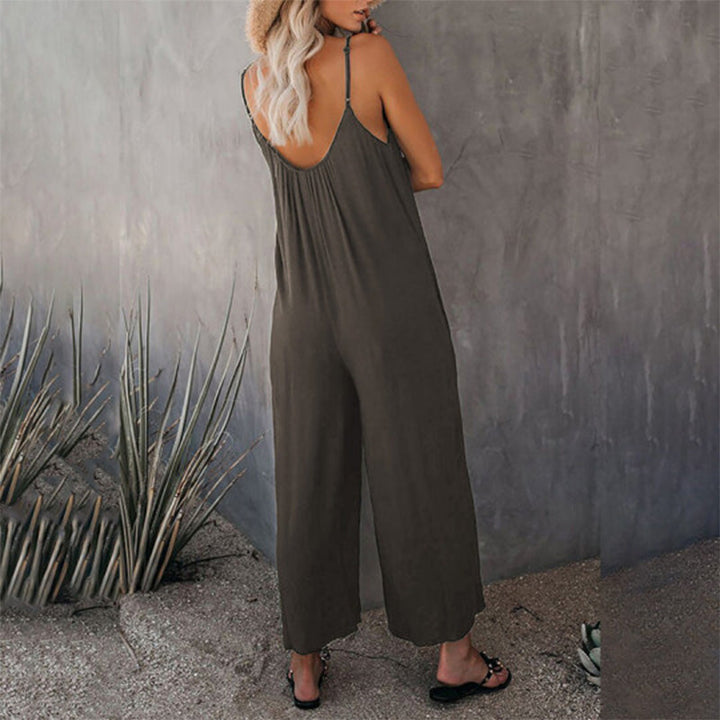 Lös dam cami stretch jumpsuit i flera färger, polyesterblandning, flytande passform, perfekt för sommaraktiviteter.