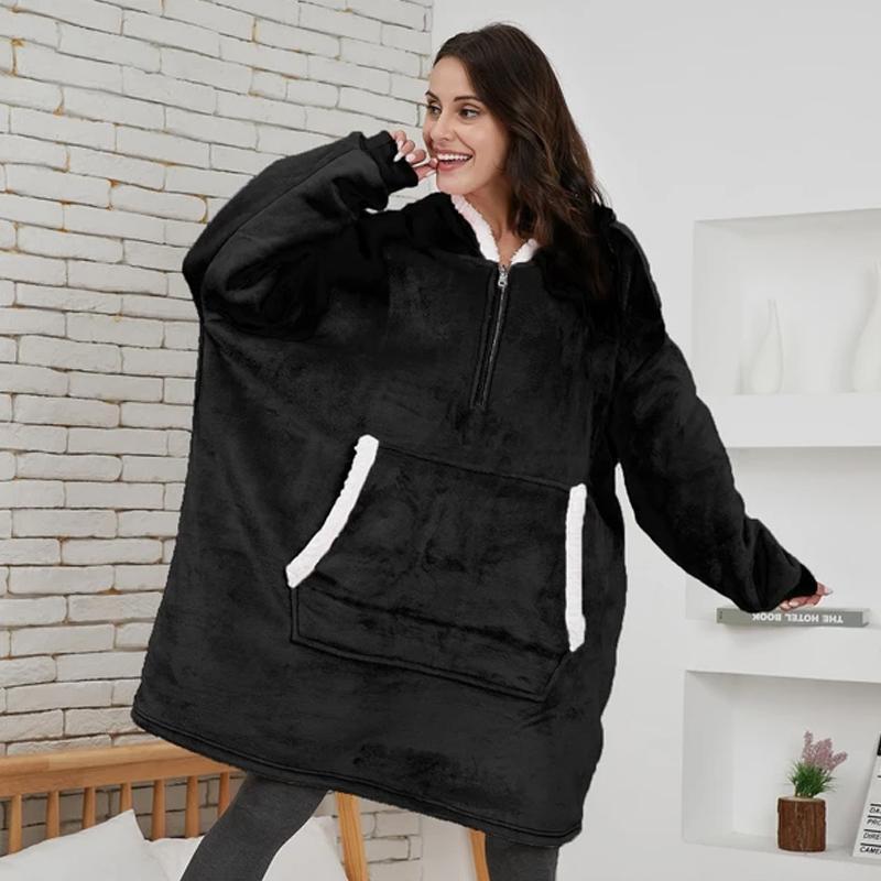 "Lös och mysig hoodie för dam och herr med stor ficka, rymlig huva och flera färgalternativ för maximal komfort."