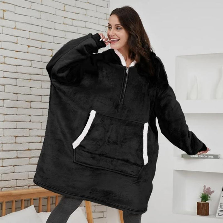 "Lös och mysig hoodie för dam och herr med stor ficka, rymlig huva och flera färgalternativ för maximal komfort."