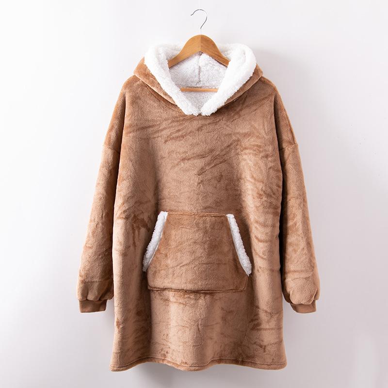 "Lös och mysig hoodie för dam och herr med stor ficka, rymlig huva och flera färgalternativ för maximal komfort."