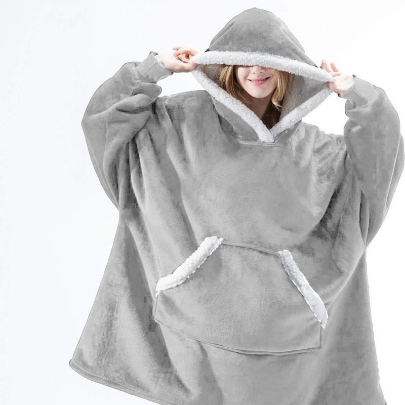 "Lös och mysig hoodie för dam och herr med stor ficka, rymlig huva och flera färgalternativ för maximal komfort."