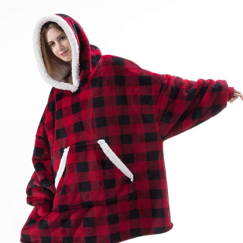 "Lös och mysig hoodie för dam och herr med stor ficka, rymlig huva och flera färgalternativ för maximal komfort."