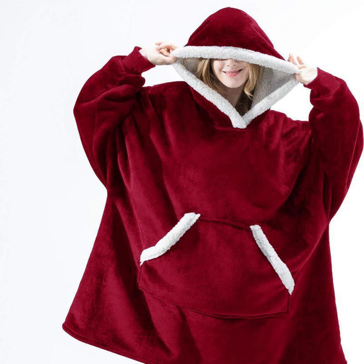 "Lös och mysig hoodie för dam och herr med stor ficka, rymlig huva och flera färgalternativ för maximal komfort."