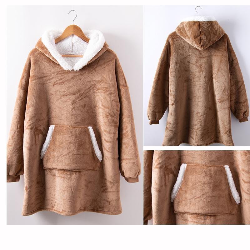 "Lös och mysig hoodie för dam och herr med stor ficka, rymlig huva och flera färgalternativ för maximal komfort."