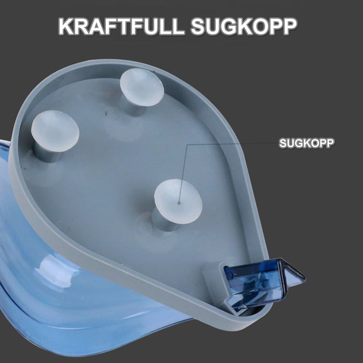 "Lövformad återvinningsbar tvålkopp i blått med smart dränering och sugpropp för stabil installation i badrum."