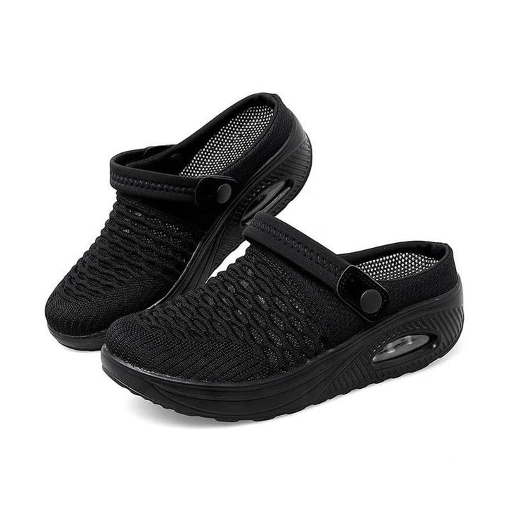 "Luftiga damtofflor med grå stickad ovandel och bred rund tå, slip-ons med stötdämpande luftkudde-sula, vardagsanvändning."