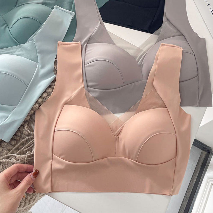 "Lyxig bh i ett stycke för kvinnor, med spetskant och mesh-ringning, i elegant design för ultimat stöd och komfort."