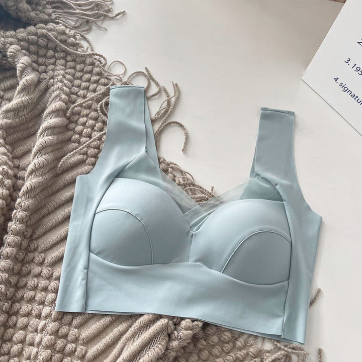 "Lyxig bh i ett stycke för kvinnor, med spetskant och mesh-ringning, i elegant design för ultimat stöd och komfort."