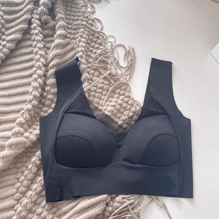 "Lyxig bh i ett stycke för kvinnor, med spetskant och mesh-ringning, i elegant design för ultimat stöd och komfort."