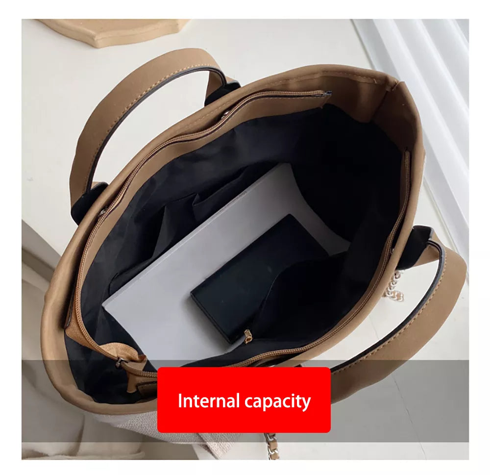Vacker kvinnors axelväska, lyxig och elegant. Rymlig design som en praktisk modeaccessoar.